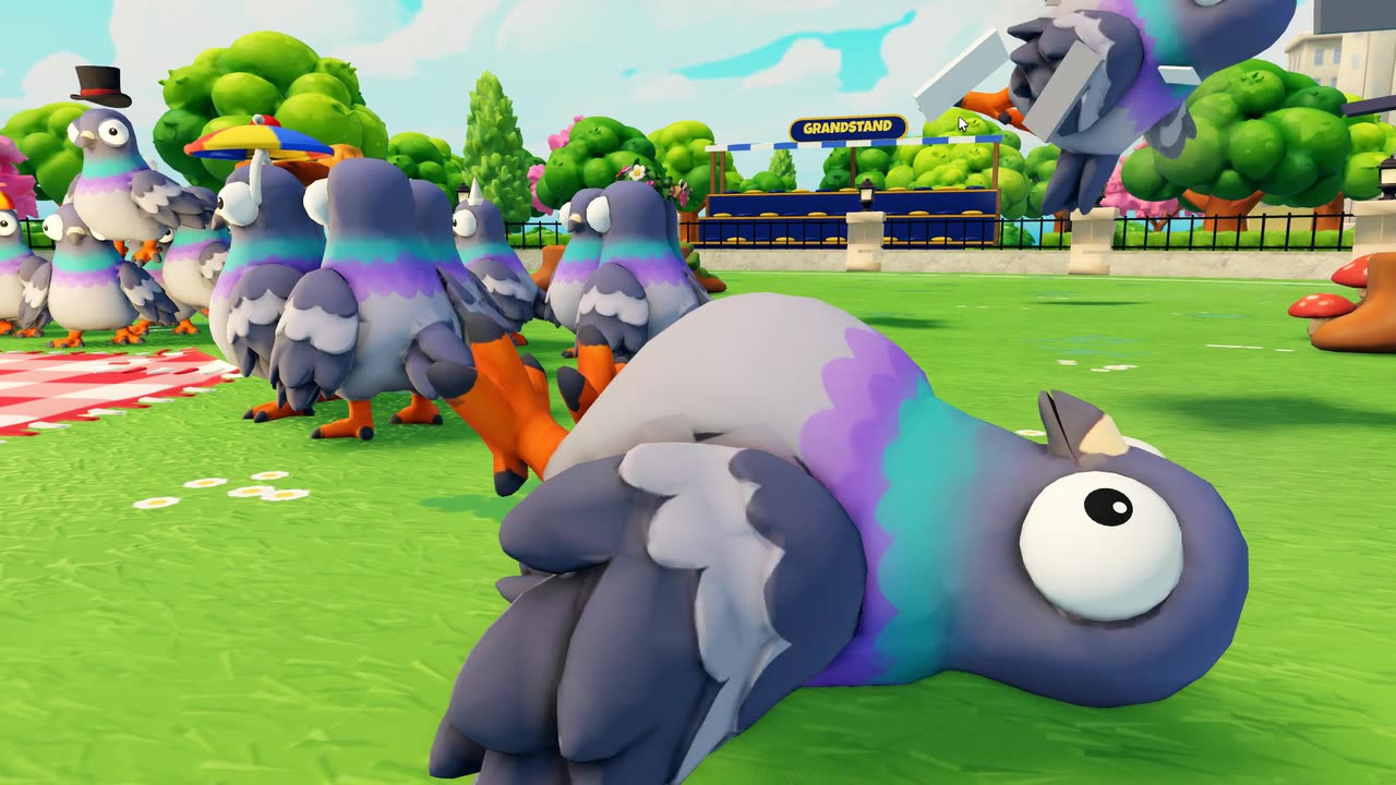 A pigeon slipping over on the grass
